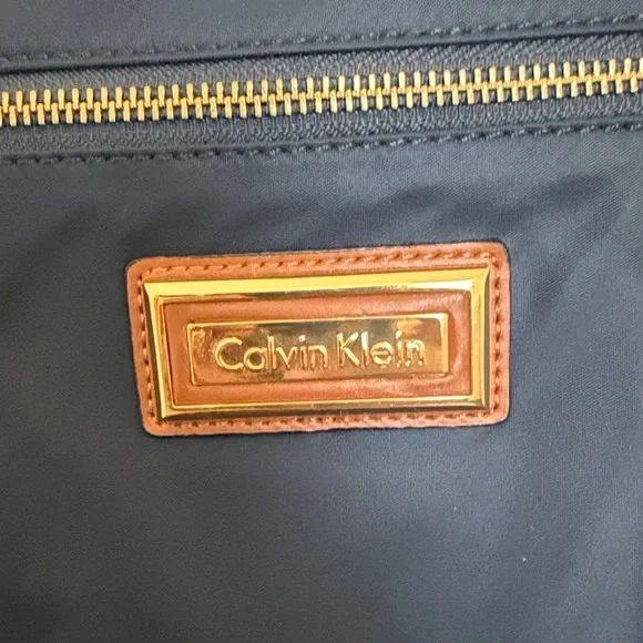 VINTAGE Calvin Klein Navy Messenger/ Crossbody Bag with Tan Adjustable Strap. - Picture 2 of 16